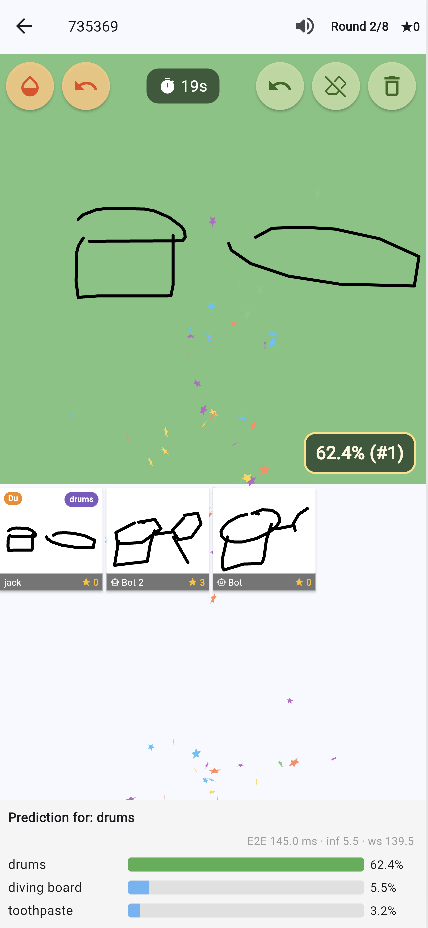 DrawClash auf dem Smartphone: eine Zeichnung mit Live-Erkennung 'drums' bei 62,4 %.